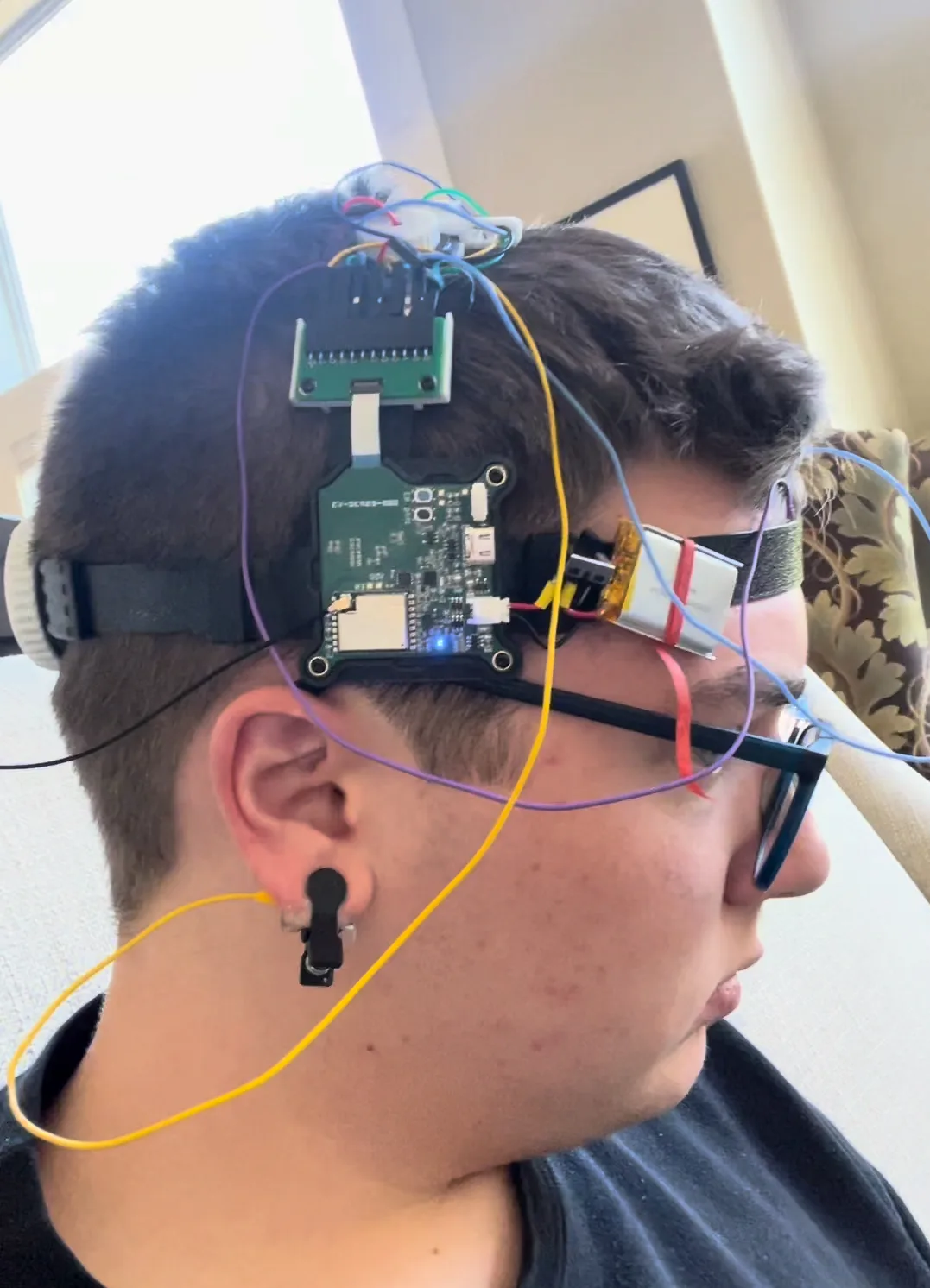 Ronan Grant wearing the BCI headset